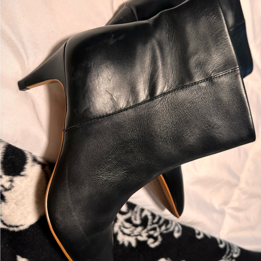 Dolce Vita sleek mid bootie. Buttery soft leather for a compliment worthy look!
